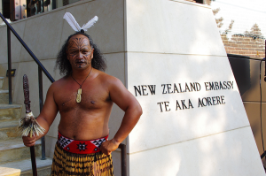 Maori-Haka-Performer-Standing-In-Front-Of-The-New-Zealand-Embassy